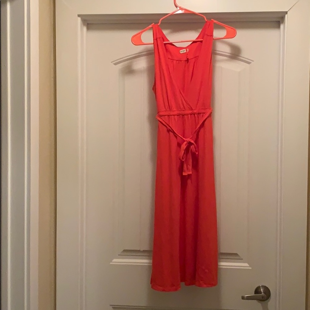 Knee length coral colored cute summertime dress